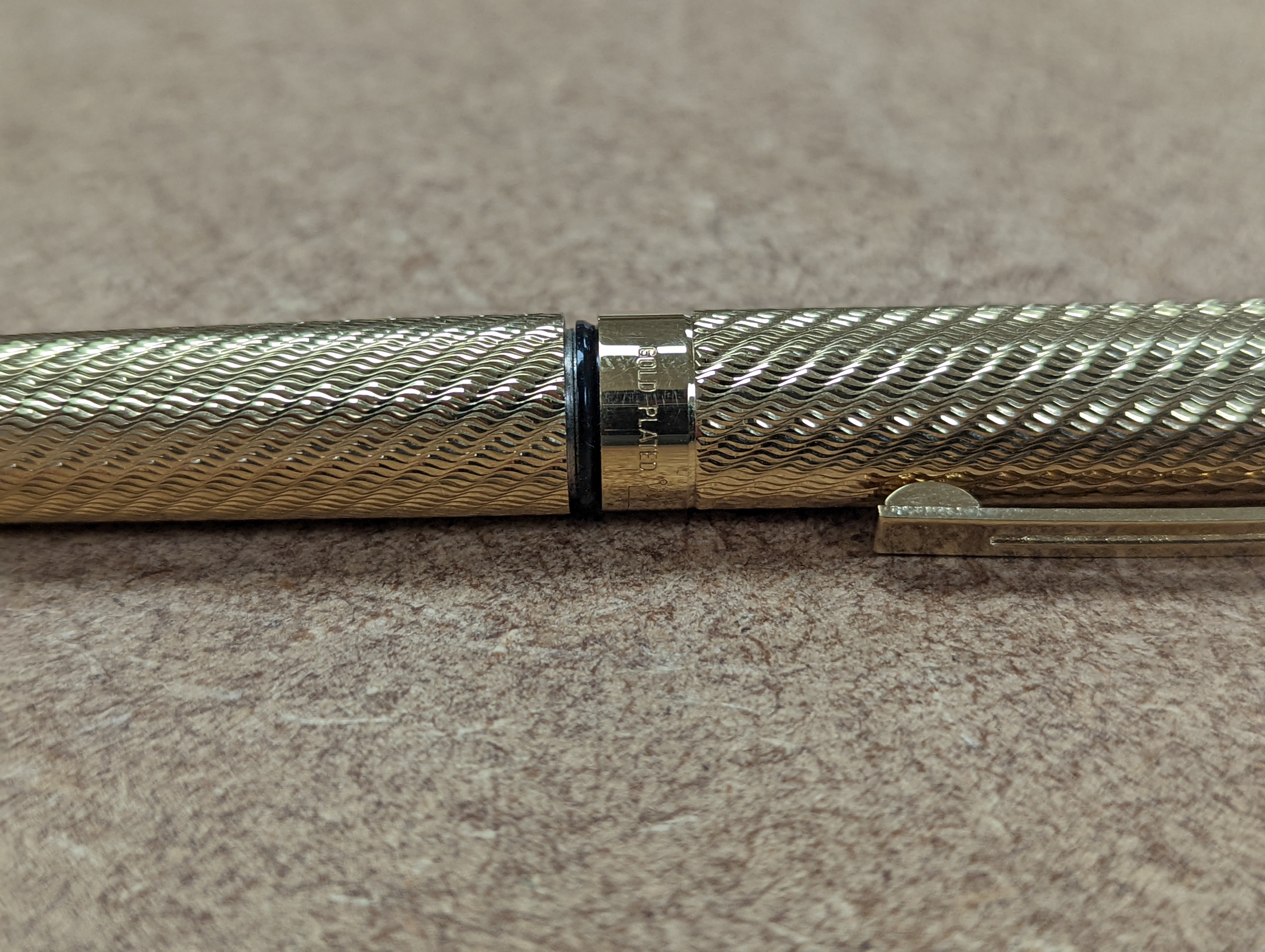 A cased gold plated Shaeffer fountain pen.